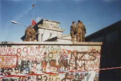 The Berlin Wall right before the ultimate triumph of Air Force accounting procedures. Photo Credit: Yann via  Wikimedia Commons